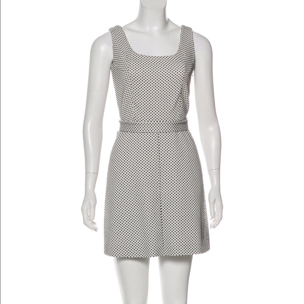 Polka dot dress, with belt tied in the back